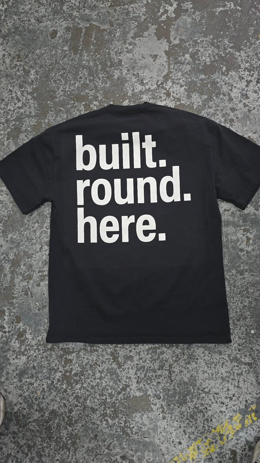 MYSTERY BLACK TEE. BUILT ROUND HERE