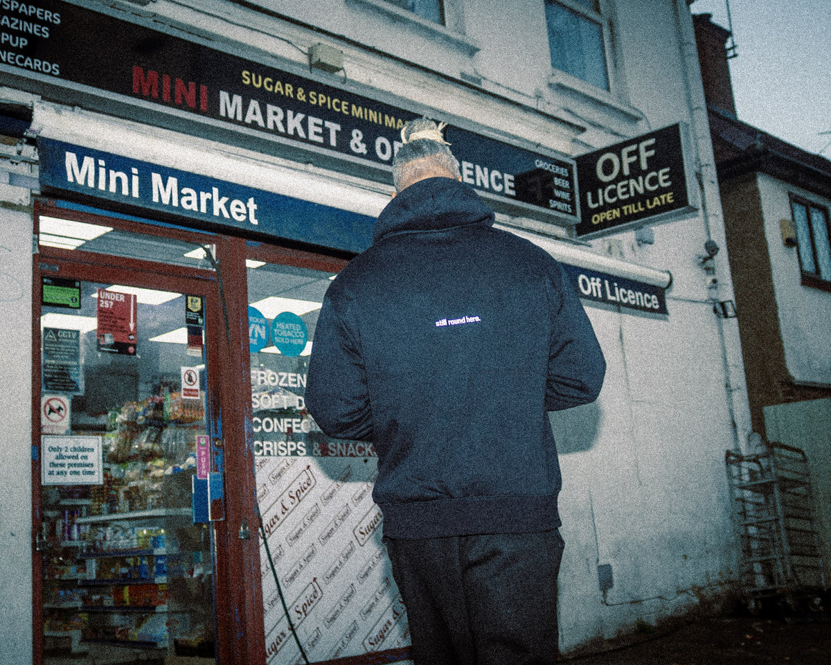 STILL ROUND HERE HOODIE - PRE ORDER ONLY.